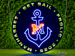 Custom LED neon logo sign featuring cut-out backlit letters and illuminated graphics for event branding and promotional displays.