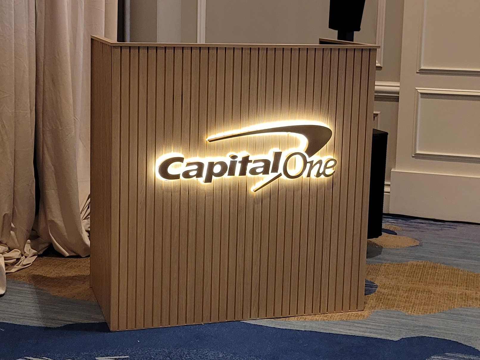 Custom reverse lit halo letters installed on a branded DJ booth for a corporate event.