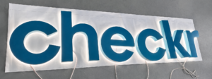 Painted face reverse halo lit letters illuminated during fabrication and pre-shipment testing.