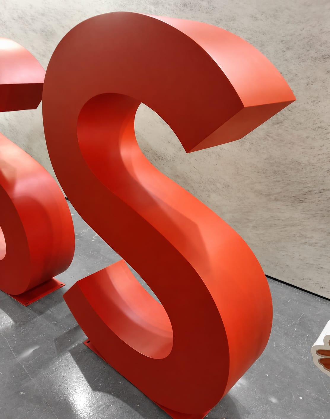 Close-up of the dimensional S letter in the Sacred Heart outdoor sign