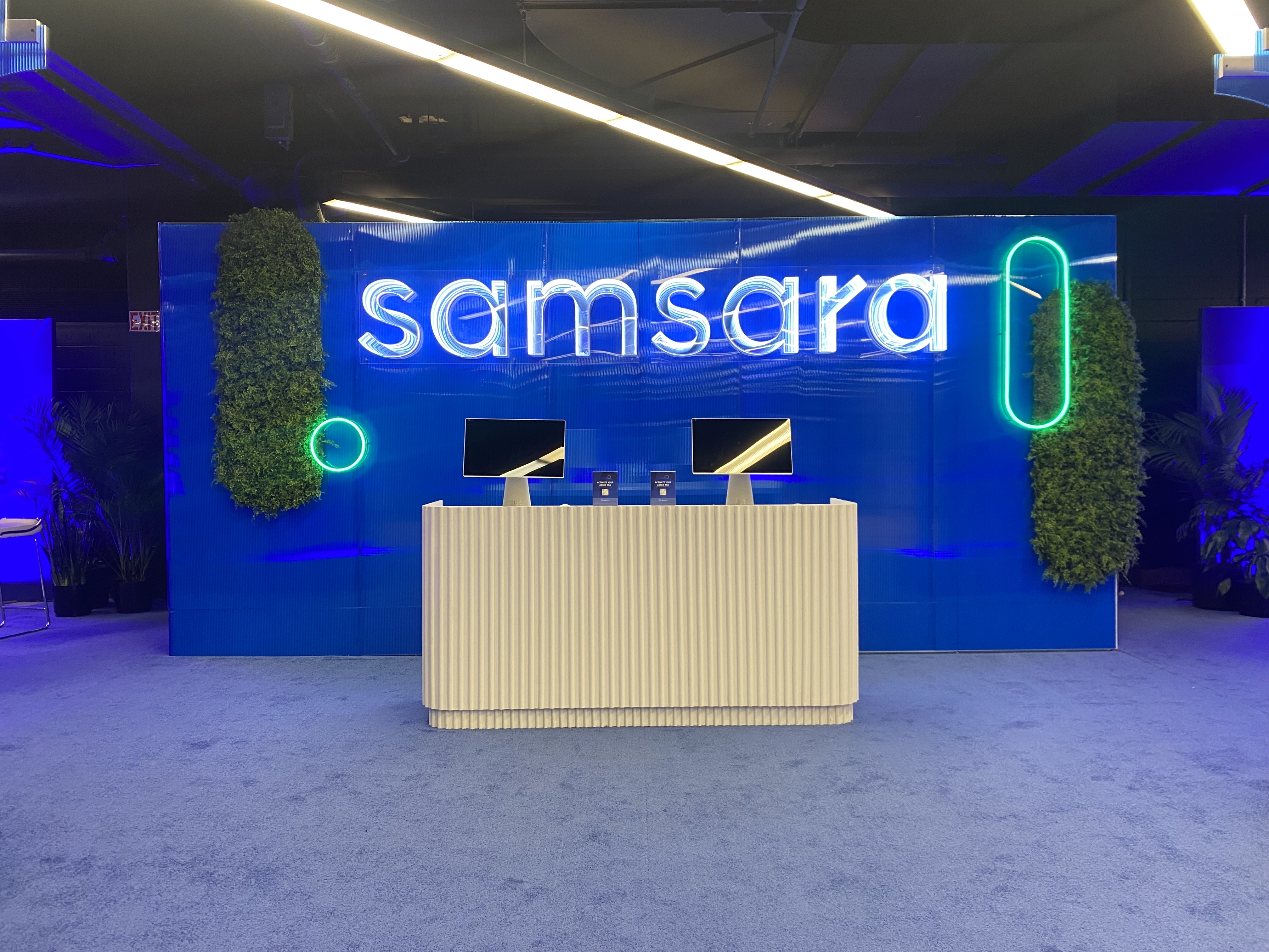Samsara infinity channel letters in a wide event installation view