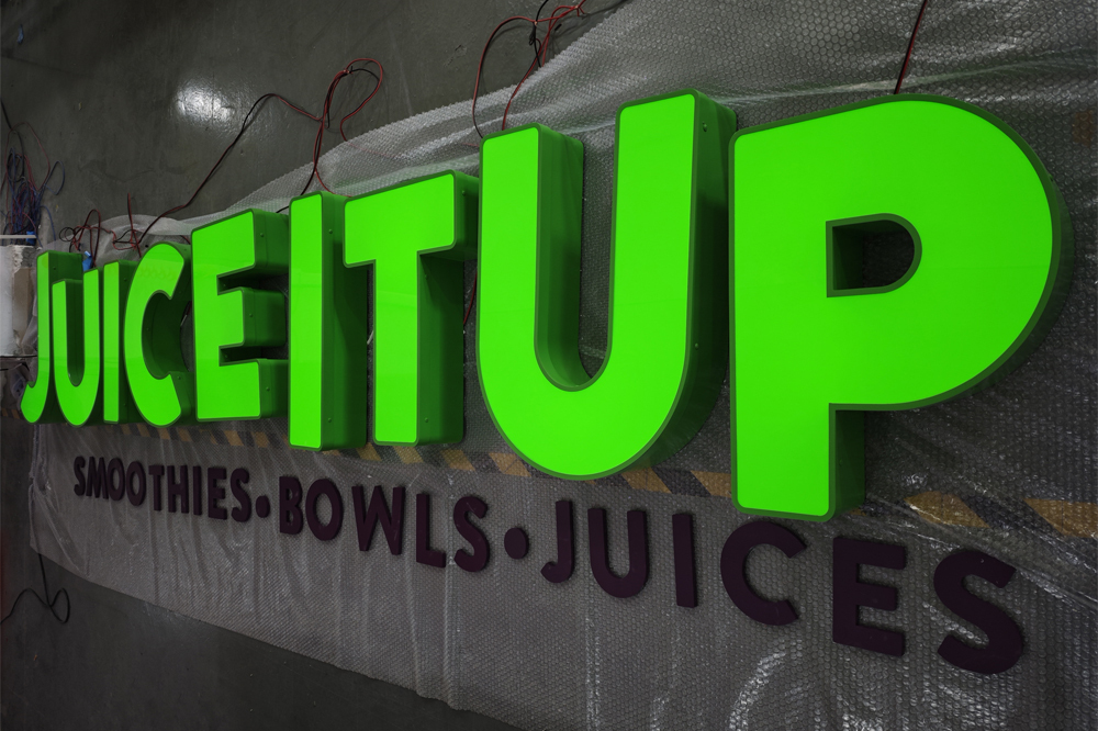 Green Juice It Up front-lit letters with a fixed acrylic face